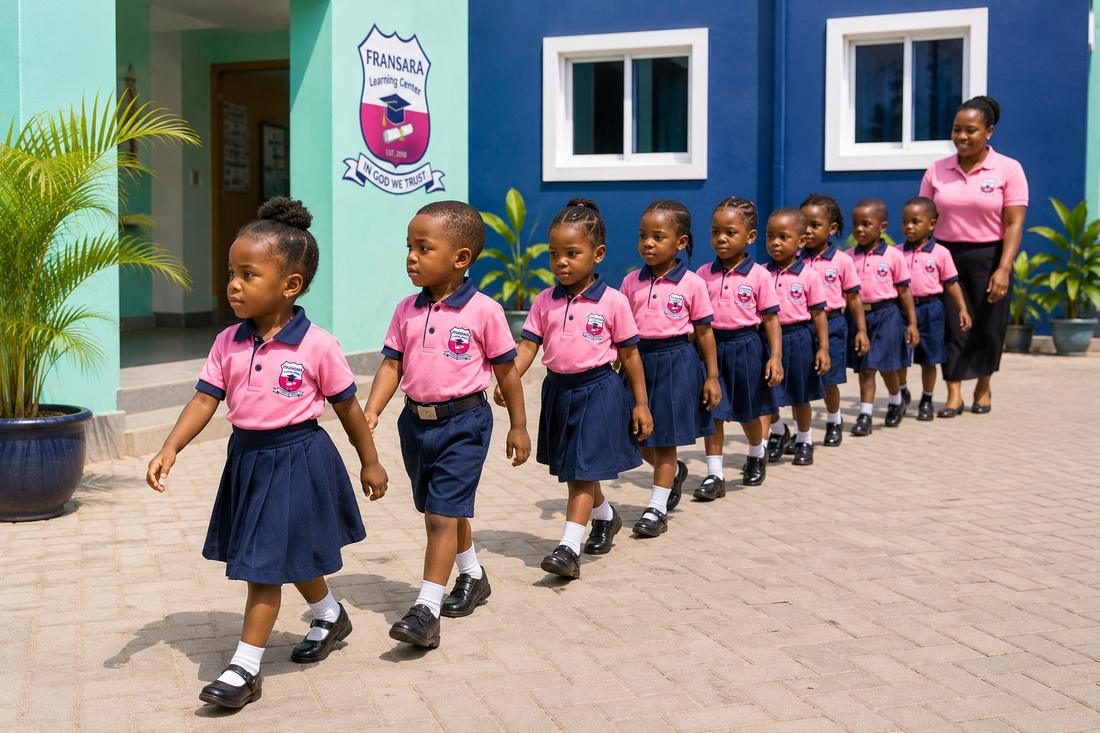 Pupils lining up in uniform outside the school